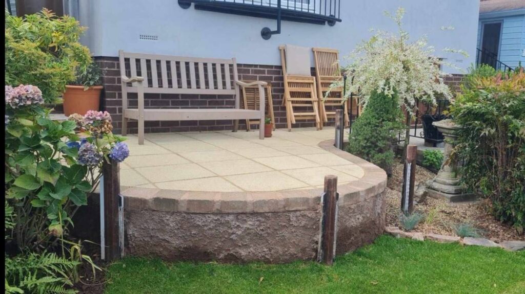 Patio being installed on a Tiverton home by Garden Fantastic