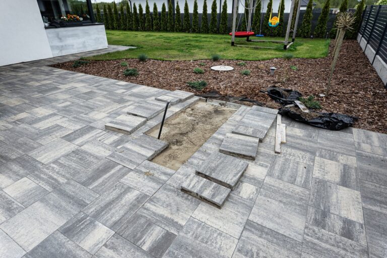 Patio slabs being installed in Tiverton